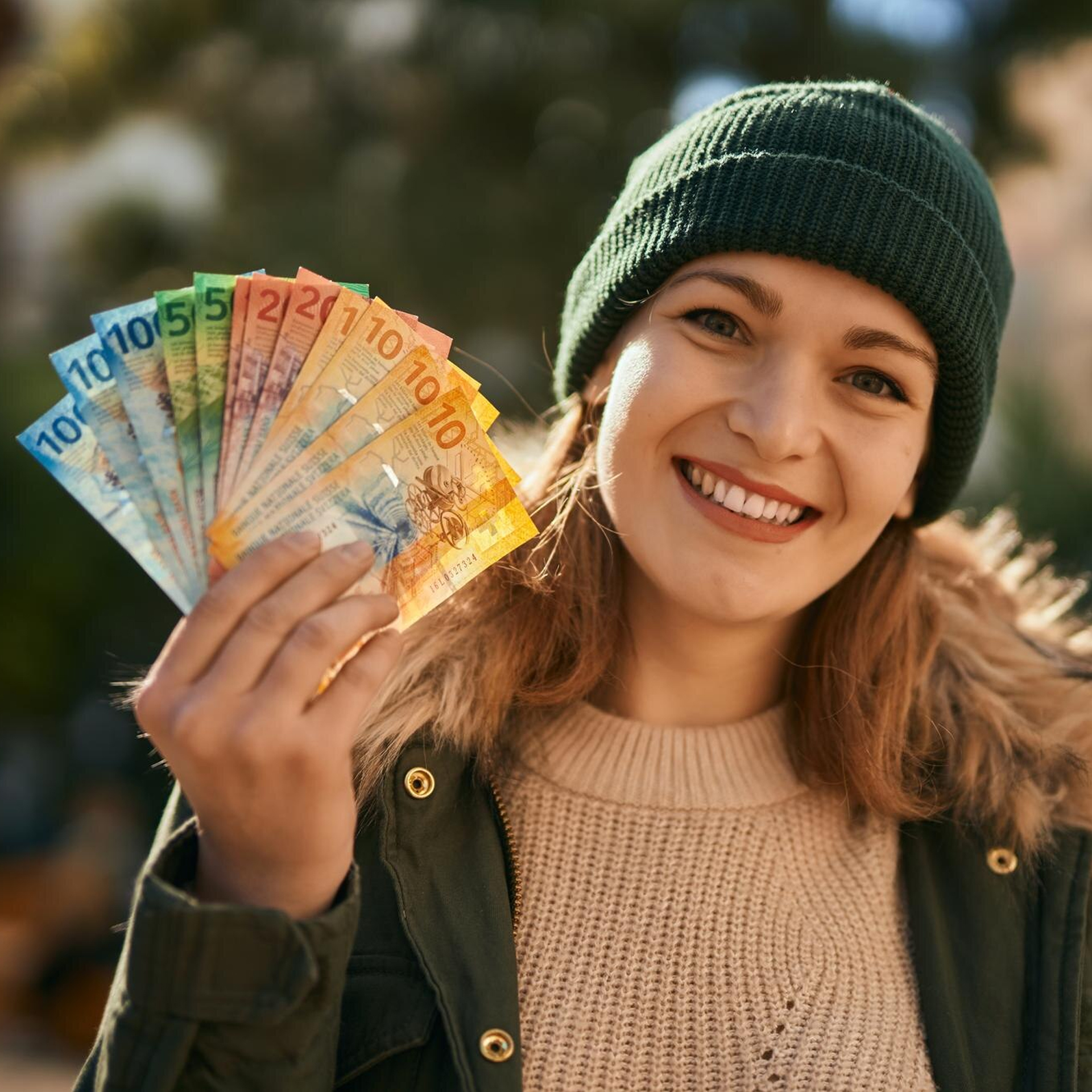 Happy Lady with Foreign Currency
